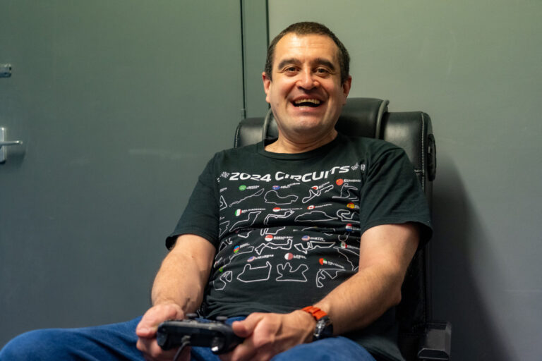 A man sat in a gaming chair