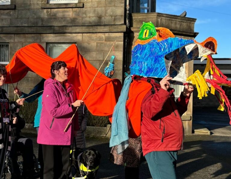 a group of people walking in a parade