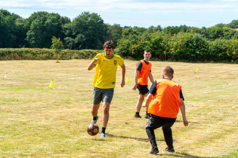 a group of men playing football